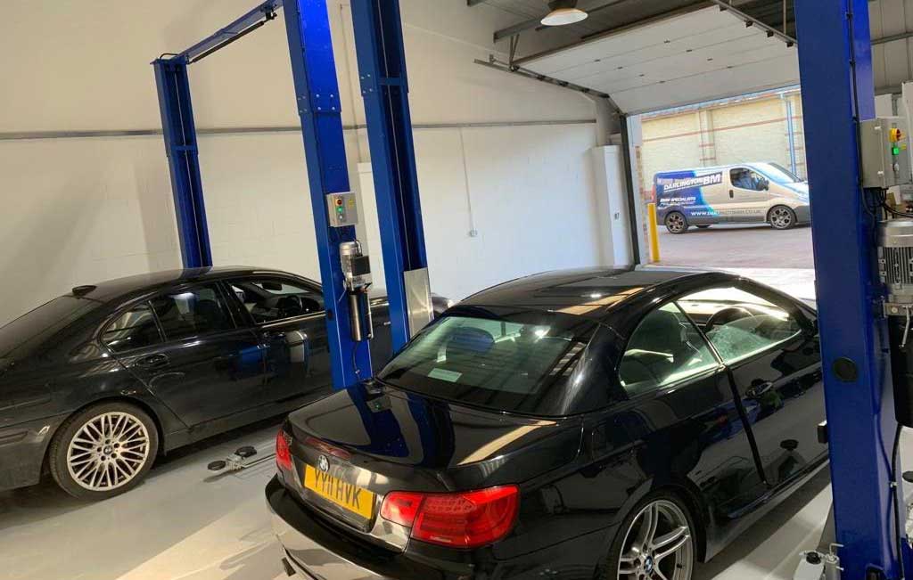Blue BMW inside DarlingtonBM Garage
